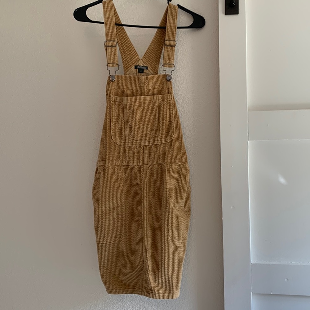 Tan overall skirt.